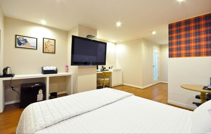 Imagen de la habitación del Motel Seven Songjeong. Foto 10