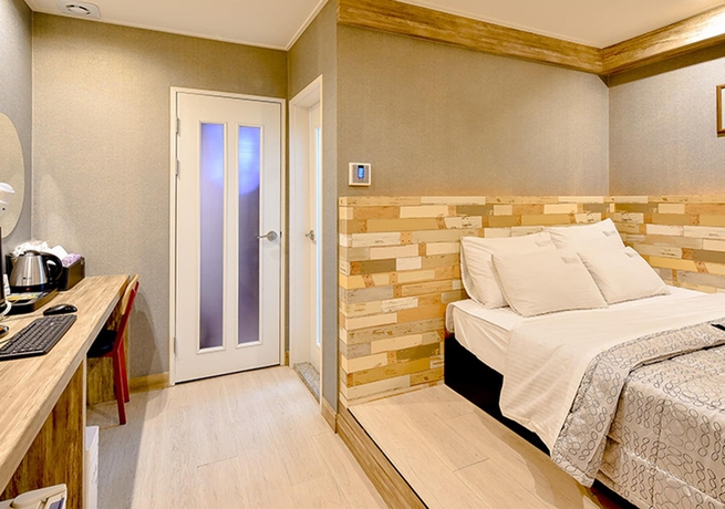 Imagen de la habitación del Motel Seven Songjeong. Foto 11