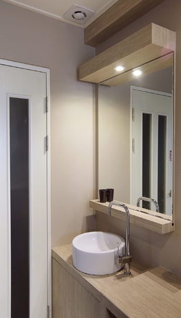Imagen de la habitación del Motel Seven Songjeong. Foto 14