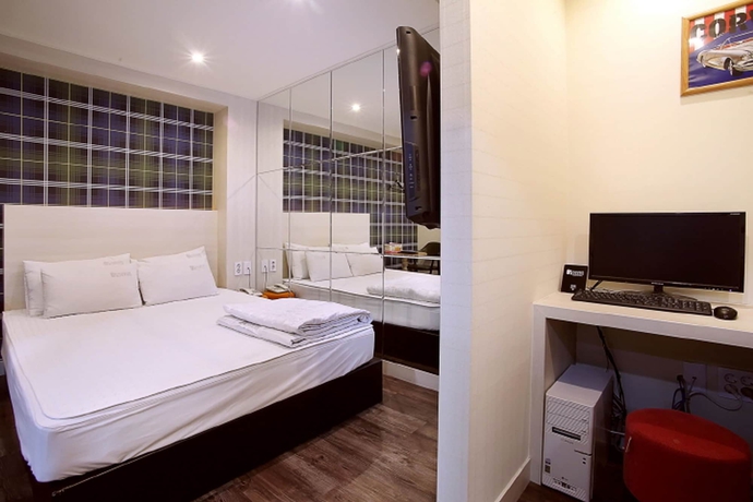 Imagen de la habitación del Motel Seven Songjeong. Foto 17