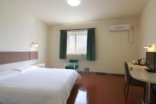 Imagen de la habitación del Motel Shanghai Jinshajiang Road Daduhe Road Metro. Foto 5