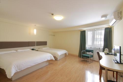 Imagen de la habitación del Motel Shanghai Jinshajiang Road Daduhe Road Metro. Foto 6