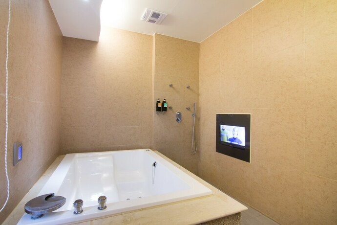 Imagen de la habitación del Motel Shihua. Foto 21