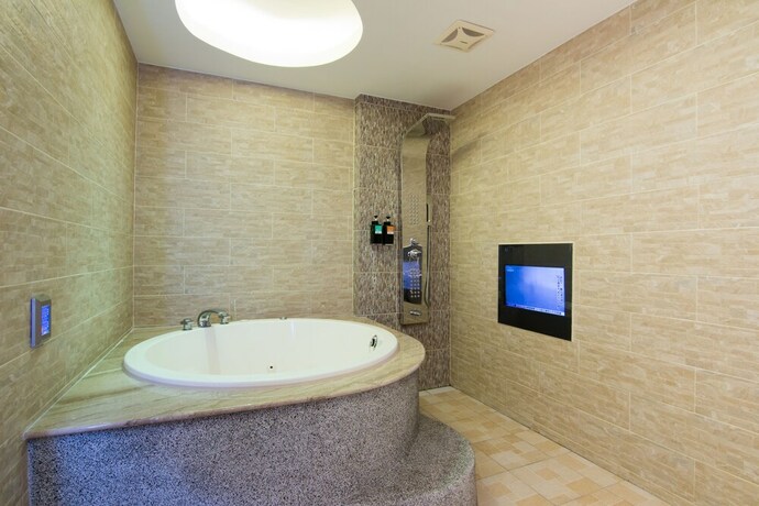 Imagen de la habitación del Motel Shihua. Foto 23