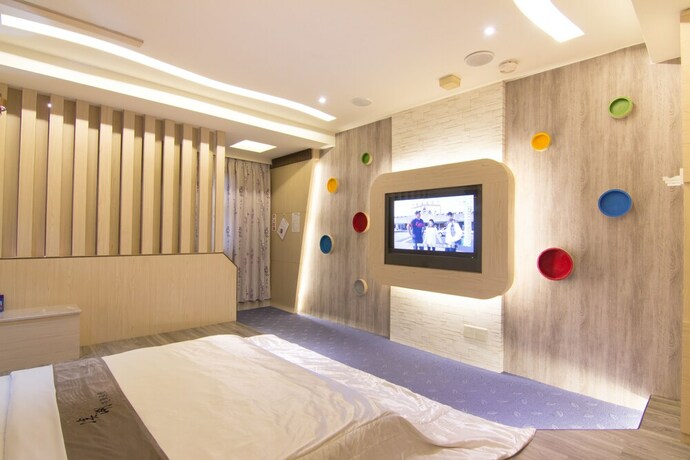 Imagen de la habitación del Motel Shihua. Foto 24