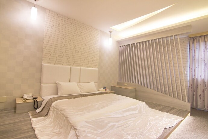 Imagen de la habitación del Motel Shihua. Foto 30