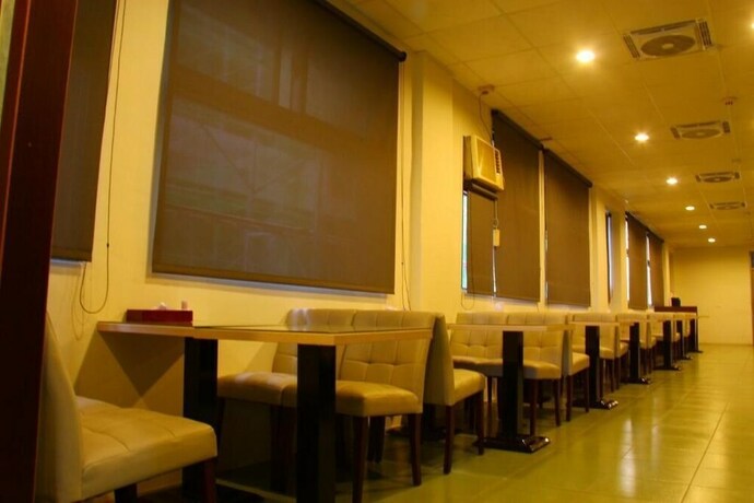 Imagen del bar/restaurante del Motel Shinyes. Foto 17
