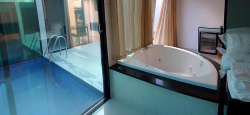 Imagen de la habitación del Motel Status Perimetral Adults Only. Foto 8