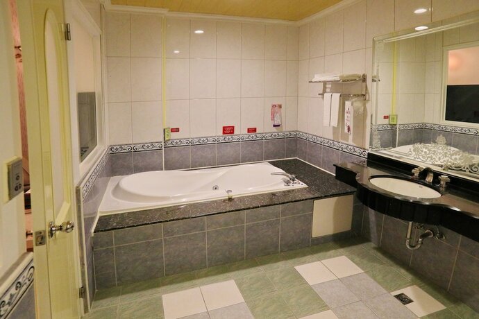 Imagen de la habitación del Motel Summer House, Tainan. Foto 11