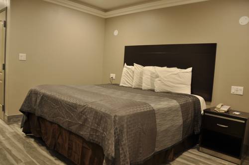 Imagen de la habitación del Motel Sun Light, Downey. Foto 2