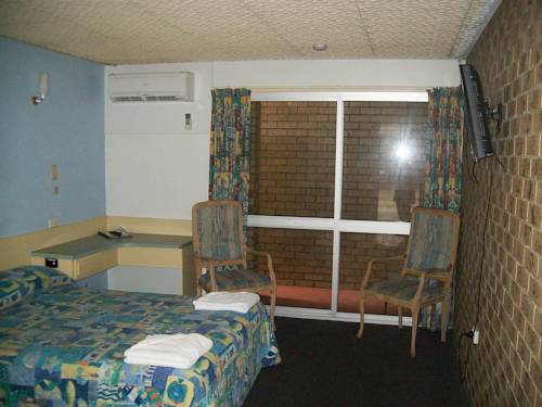 Imagen de la habitación del Motel Sun Plaza Mackay. Foto 2
