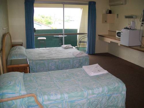 Imagen de la habitación del Motel Sun Plaza Mackay. Foto 3