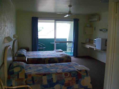 Imagen de la habitación del Motel Sun Plaza Mackay. Foto 4