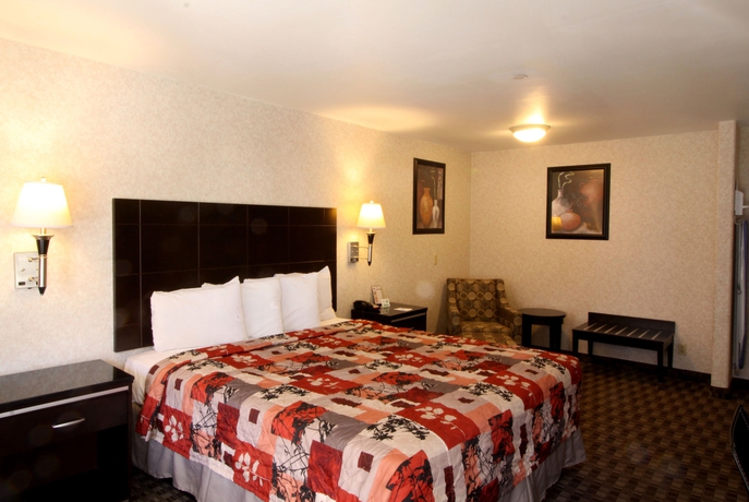 Imagen de la habitación del Motel Sunburst Spa and Suites. Foto 2