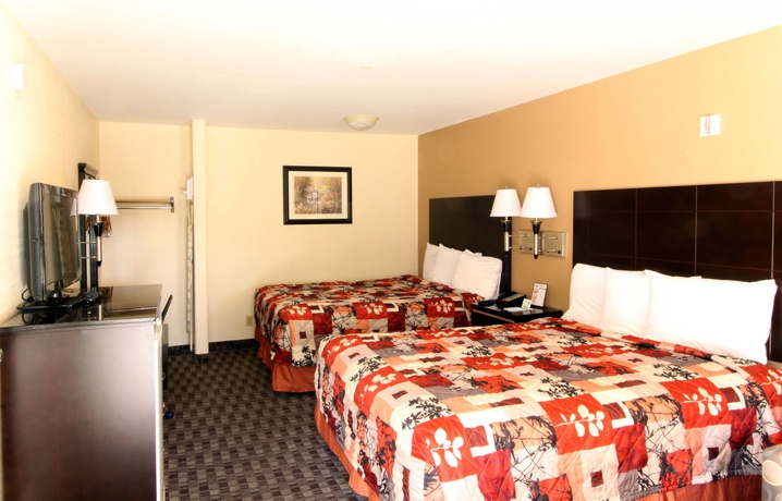 Imagen de la habitación del Motel Sunburst Spa and Suites. Foto 5