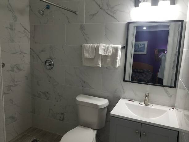 Imagen de la habitación del Motel Sunny South. Foto 12