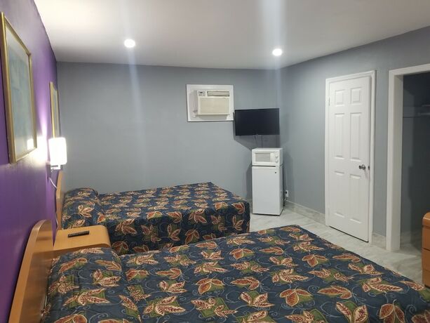 Imagen de la habitación del Motel Sunny South. Foto 13