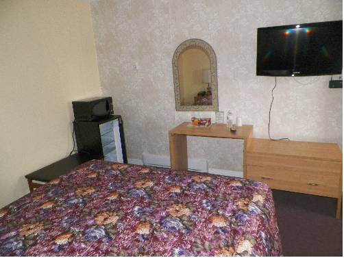 Imagen de la habitación del Motel Sunparlor. Foto 10
