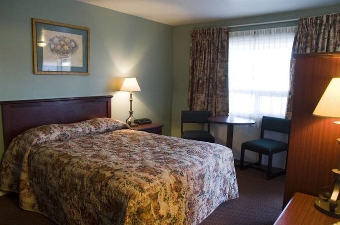 Imagen de la habitación del Motel Super 7, London. Foto 4
