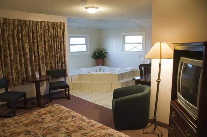 Imagen de la habitación del Motel Super 7, London. Foto 5