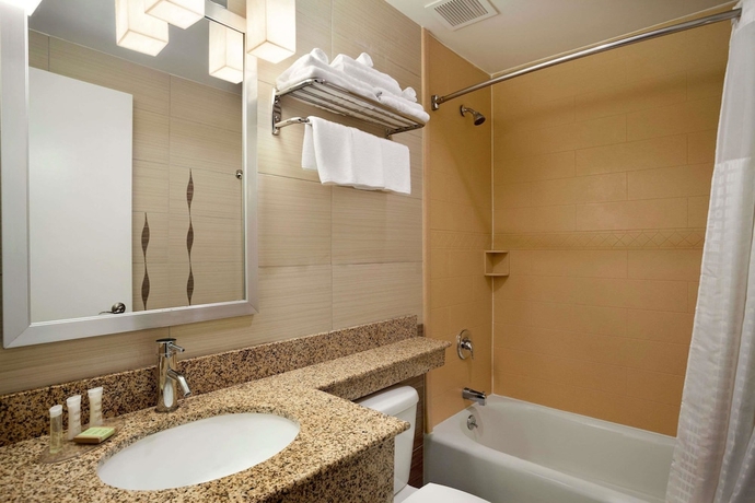 Imagen de la habitación del Motel Super 8 Bronx. Foto 13