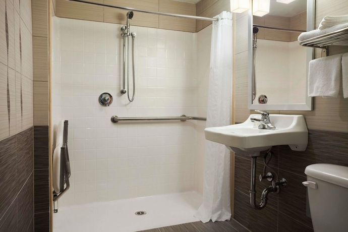 Imagen de la habitación del Motel Super 8 Bronx. Foto 15