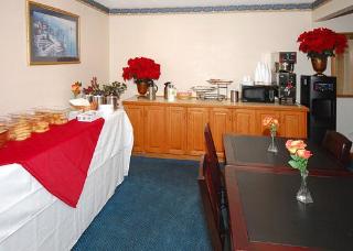Imagen del bar/restaurante del Motel Super 8, Raleigh. Foto 3