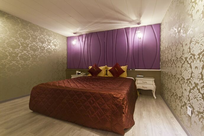 Imagen de la habitación del Motel Surreal. Foto 30