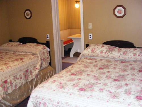 Imagen de la habitación del Motel Swiss Chalets. Foto 13