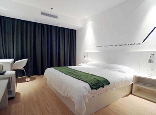 Imagen de la habitación del Motel Taizhou Xinghua Banqiao Road. Foto 5