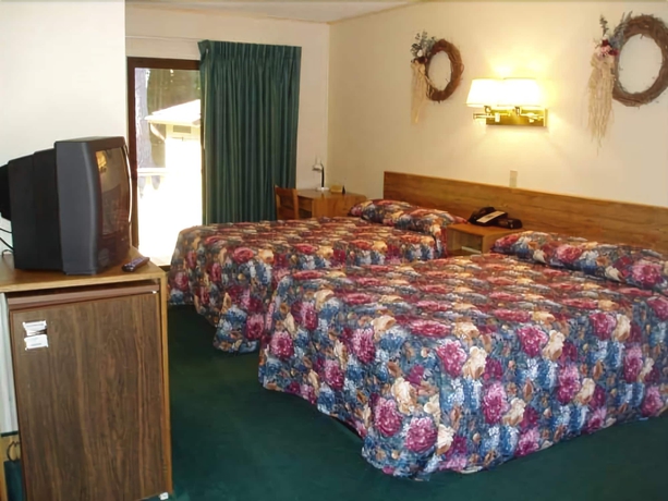 Imagen de la habitación del Motel Tall Pines. Foto 2