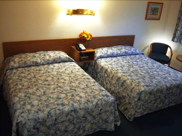 Imagen de la habitación del Motel Tall Pines. Foto 5
