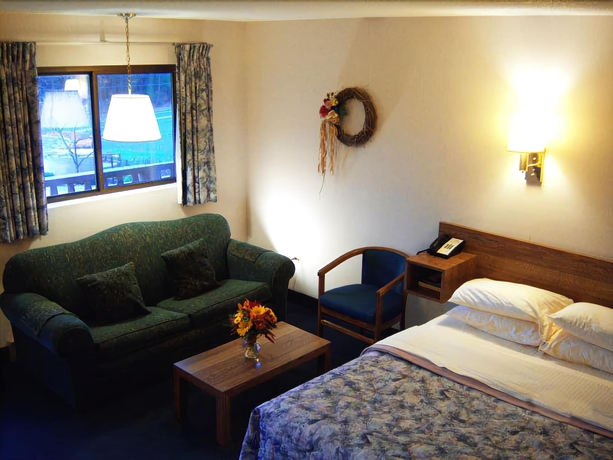 Imagen de la habitación del Motel Tall Pines. Foto 7