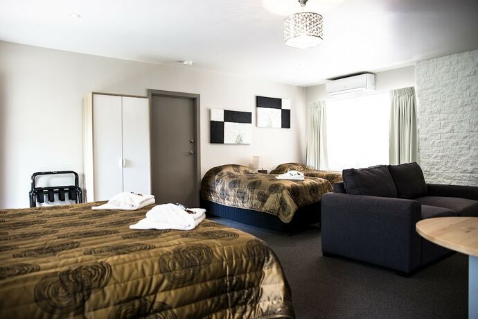 Imagen de la habitación del Motel Tall Trees. Foto 18