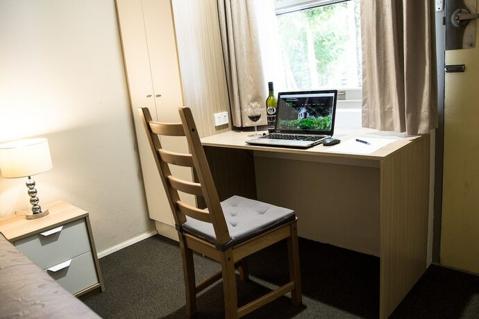 Imagen de la habitación del Motel Tall Trees. Foto 19