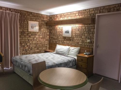 Imagen de la habitación del Motel Ten Dollar Town. Foto 9