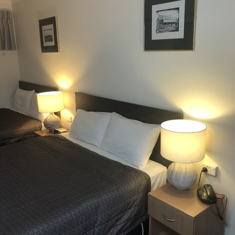 Imagen de la habitación del Motel Ten Dollar Town. Foto 9