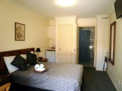 Imagen de la habitación del Motel The Carmel Yamba. Foto 4