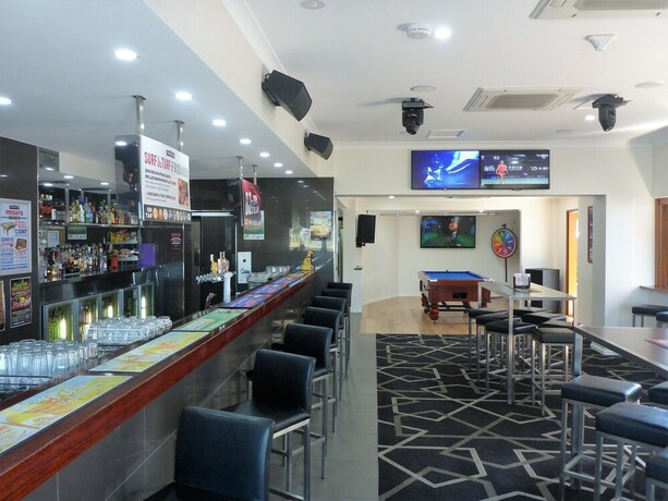 Imagen del bar/restaurante del Motel The Commercial Hotel. Foto 21