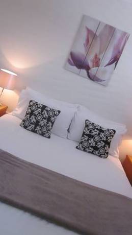 Imagen de la habitación del Motel The Cosmopolitan and Serviced Apartments. Foto 1