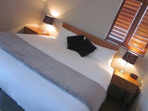 Imagen de la habitación del Motel The Cosmopolitan and Serviced Apartments. Foto 3