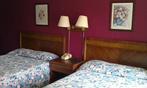 Imagen de la habitación del Motel The Tallwood. Foto 7