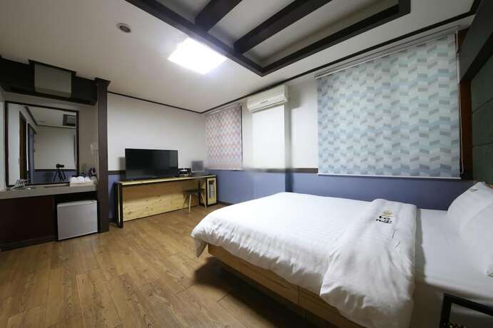 Imagen de la habitación del Motel Theme. Foto 14