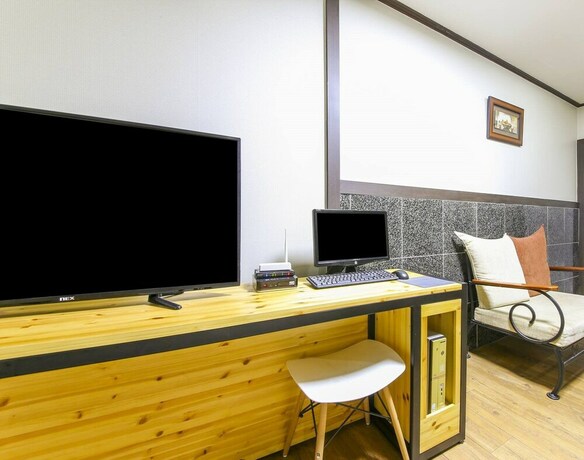 Imagen de la habitación del Motel Theme. Foto 17