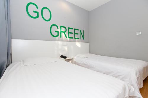 Imagen de la habitación del Motel Tianjin Hongqi Road Baoshan Road. Foto 8