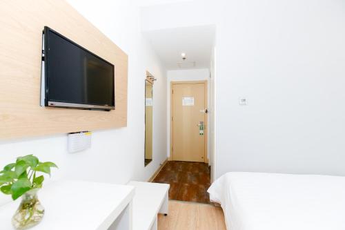 Imagen de la habitación del Motel Tianjin Hongqi Road Baoshan Road. Foto 9