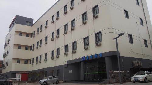 Imagen de la habitación del Motel Tianjin Hongqi Road Baoshan Road. Foto 10