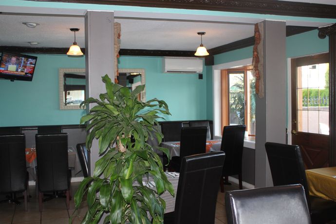 Imagen del bar/restaurante del Motel Tiki Shores Inn & Suites. Foto 3