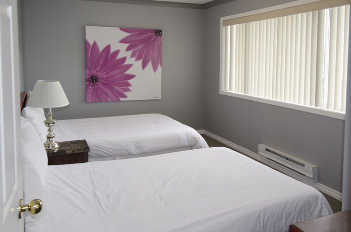 Imagen de la habitación del Motel Tiki Shores Inn & Suites. Foto 12