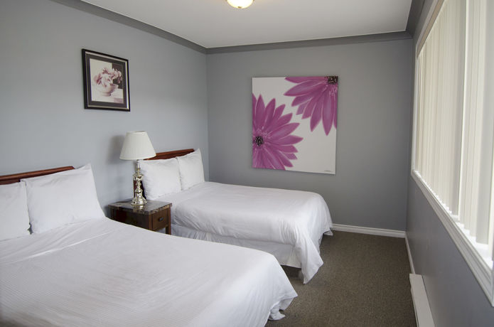 Imagen de la habitación del Motel Tiki Shores Inn & Suites. Foto 14